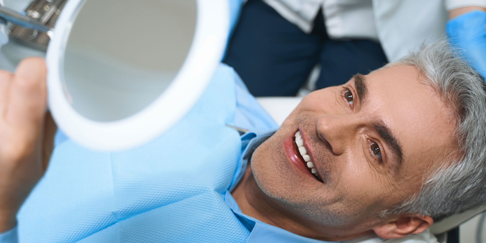 extraction patient with tooth replacement proceduredone and new confidence