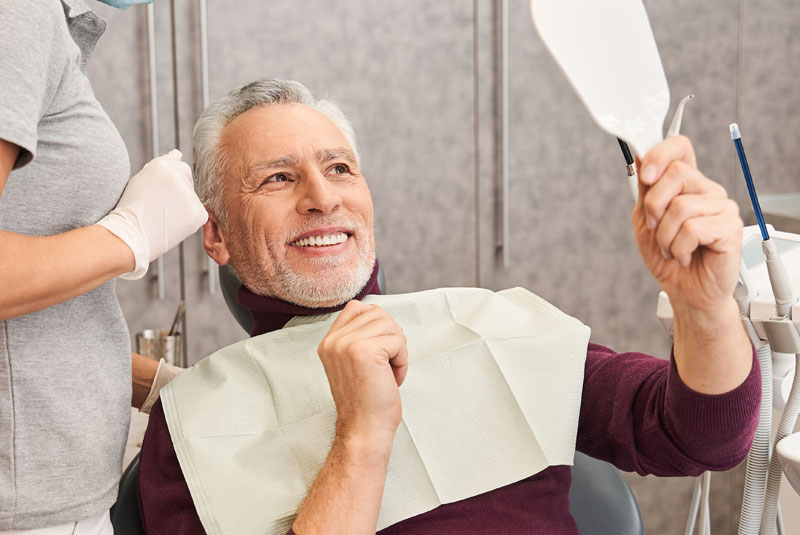 olderman after implants with new outlook on life