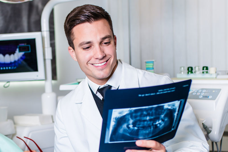 surgeon discussing dental issues