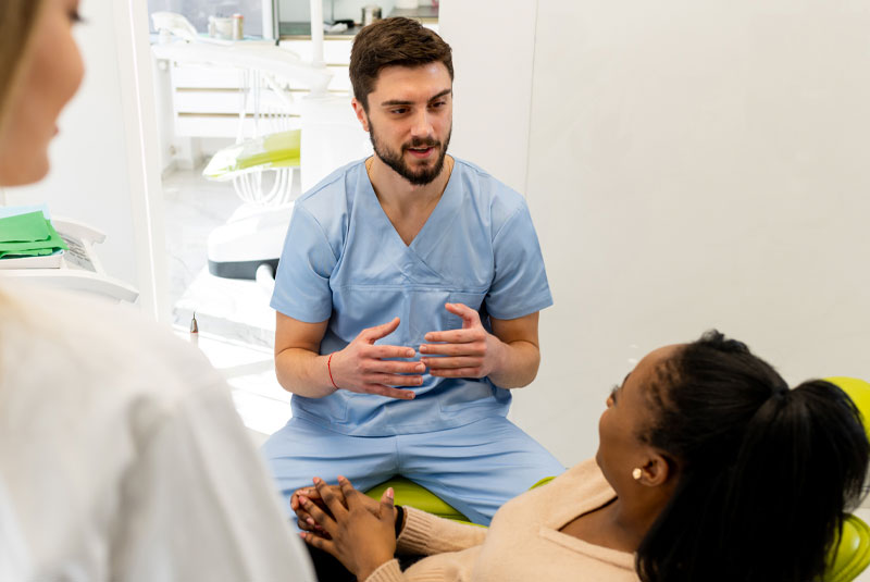 surgeon with patient discussing procedure options